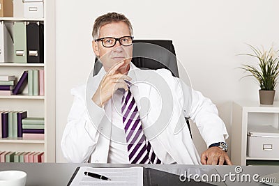 Serious Middle Age Medical Specialist Stock Photo