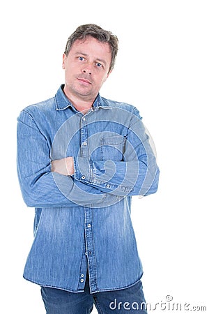 Serious middle-aged man with folded arms on white Stock Photo