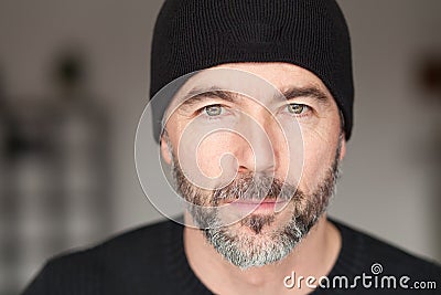 Serious Senior man wearing a toque Stock Photo