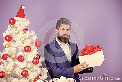 serious shoper. winter season sales. christmas shopping. bearded man presents from santa. successful businessman reward Stock Photo