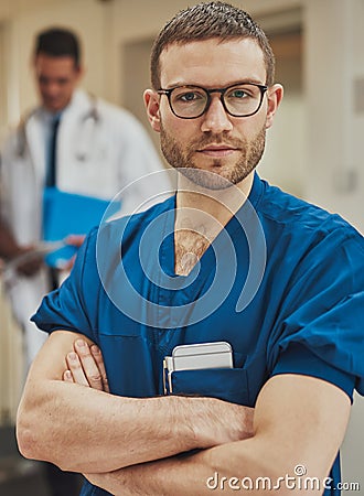 Serious surgeon looking intently at the camera Stock Photo