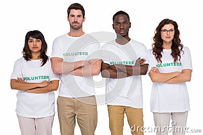 Serious teamwork standing with arms crossed Stock Photo