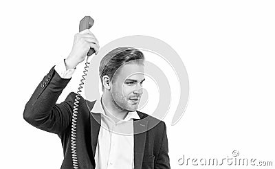 Serious telephone call manager hold old-fashioned vintage phone receiver, telephonic communication Stock Photo