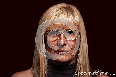 Serious woman wearing glasses portrait on isolated background Stock Photo