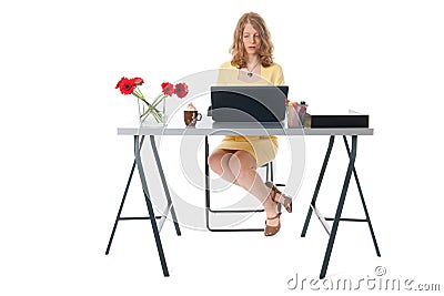 Serious working woman at the office Stock Photo