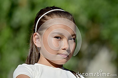 A Serious Young Philippina Female Outside Stock Photo