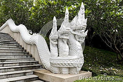 Serpent sculpture on the way up the stairs of the temple on the mountain Stock Photo
