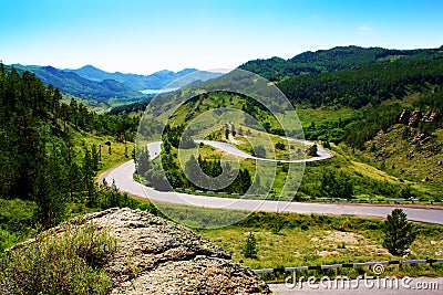 Serpentine Road in Mountains Stock Photo