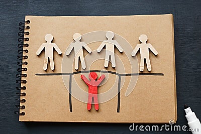 Servant leadership concept. Figures and one holds the bridge. Stock Photo