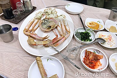 Served crab on plate and various korean banchan Stock Photo