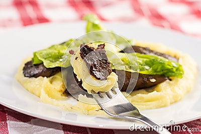 Served fried Chicken Liver with Mashed Potatoes and Lettuce Stock Photo