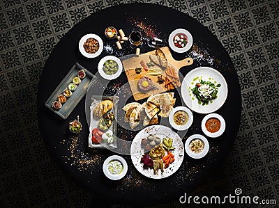 Served round table, Turkish and buckwheat dishes served table top view. Stock Photo