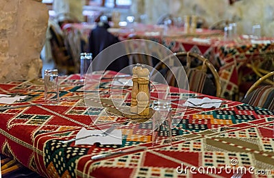 Served table ready to accept visitors in a roadside restaurant near the city of Wadi Musa in Jordan Editorial Stock Photo