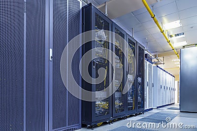 Server internet datacenter room with rows of modern mainframes. Server control center for internet provider. Network and Stock Photo