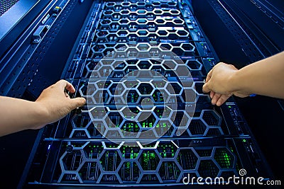 The server room tells the computer server that is working continuously. Convey the power and progress Stock Photo