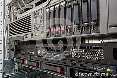 Servers stack with hard drives in a datacenter Stock Photo