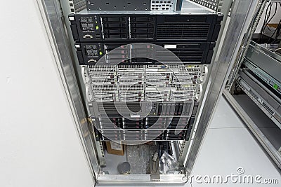 Servers stack with hard drives in a datacenter Stock Photo