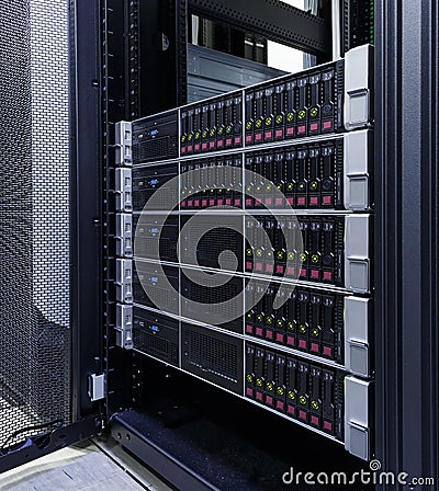 Servers stack with hard drives in datacenter for backup and data storage Stock Photo