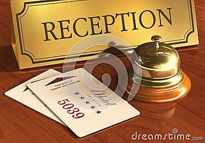 Service bell and cardkeys on hotel reception desk Stock Photo