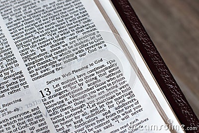 Service pleasing to God verses in open holy bible book of Hebrews Stock Photo