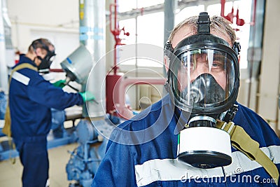 Service worker at industrial compressor station Stock Photo