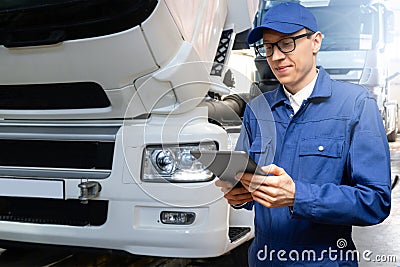 Serviceman with digital tablet Stock Photo