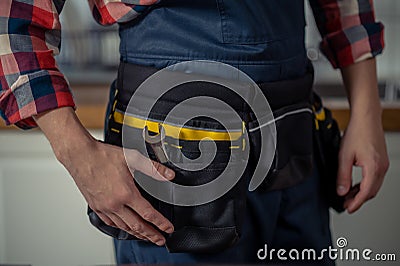 Serviceman dressed in workwear standing in the workplace Stock Photo