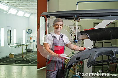 Serviceman in a workshop Stock Photo