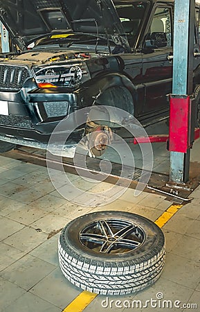 Servicing and opening the tyre of the car Editorial Stock Photo