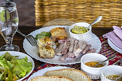 A serving plate of vegetarian food for lunch in an African restaurant, Tanzania, Africa, close up Stock Photo