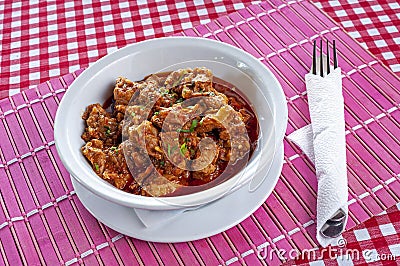 Serving of Serbian Leskovacka Muckalica in a tavern Stock Photo