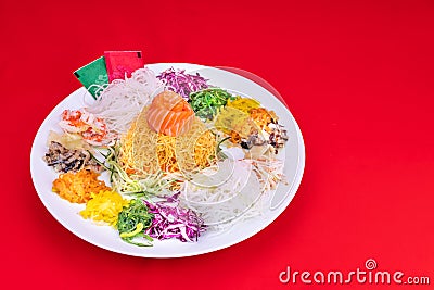 Serving of Yee Sang or Yusheng believed to bring luck Stock Photo