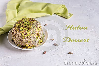 Sesame halva, green napkin and halva dessert text on white Stock Photo