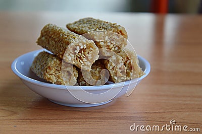Sesame roll Chinese traditional snack on cup Stock Photo