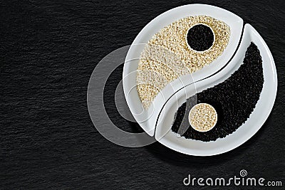 Sesame seeds in the form of Yin Yang symbol Stock Photo