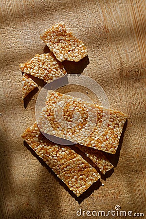 Sesame snack on a wooden board Stock Photo