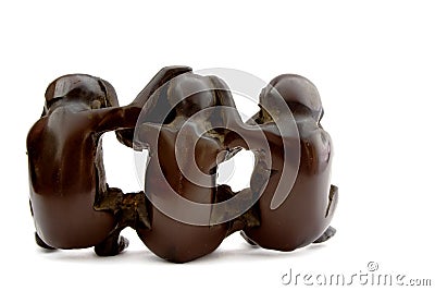 Set of 3 ebonite monkeys Stock Photo