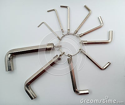 A set of allen key, hex keys, or Hexagonal key also called inbus lock with a round key chain. Stock Photo