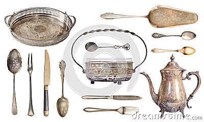 Set antique silverware. Tray, sugar bowl, spoons, forks, kettle, spatula for the cake, knife. Isolated on white background Stock Photo