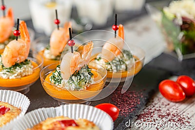 Set of appetizers. Small plates of shrimp salad Stock Photo