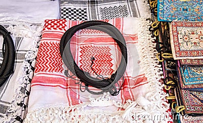 Set of arab scarf shawl keffiyeh or kafiya and Igal or Agal for sale at Jerusalem Old Town market Stock Photo