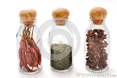 Set of assorted colorful spices in glass bottle isolated Stock Photo