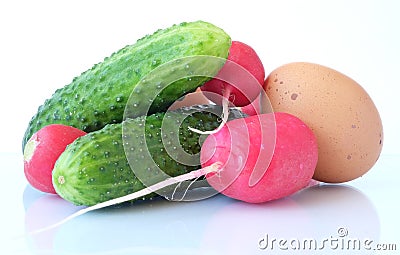 A set of basic ingredients for preparing a vitamin salad on a light background. Stock Photo