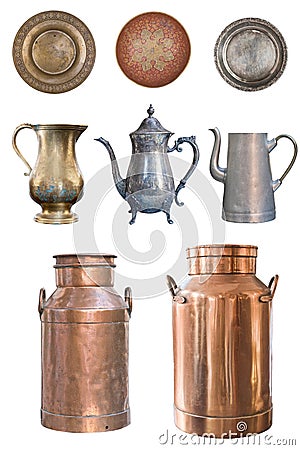 A set of beautiful old teapots, copper milkmen and plates isolated on a white background Stock Photo