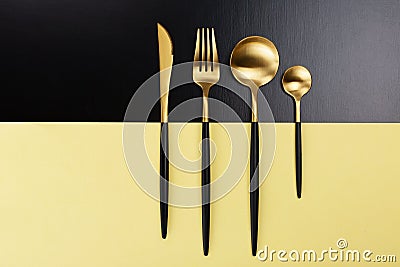 Set of black and gold cutlery Stock Photo