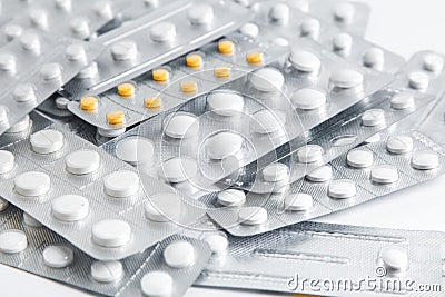 Set of blister packs of pills on white background. Stock Photo