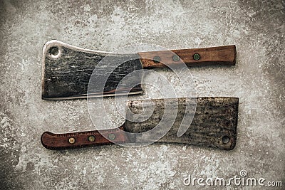Set of carbon steel blade butchers for meat chopping on metallic texture Stock Photo