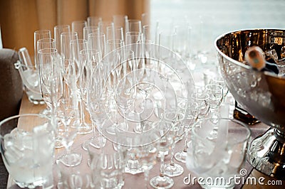 Set of clear and empty glasses for alcoholic drinks on the table Stock Photo