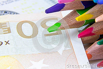 A set of color pencils and money.A School stuff.Drawing supplies Stock Photo