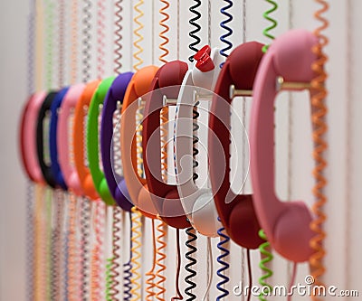 Set of color phones and wires Stock Photo